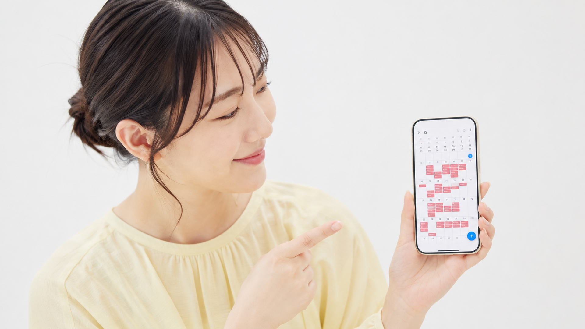 スマートフォンのカレンダーアプリで予約が埋まっている画面